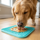 Happy dog licking Paw Crate Calming Lick Mat with peanut butter